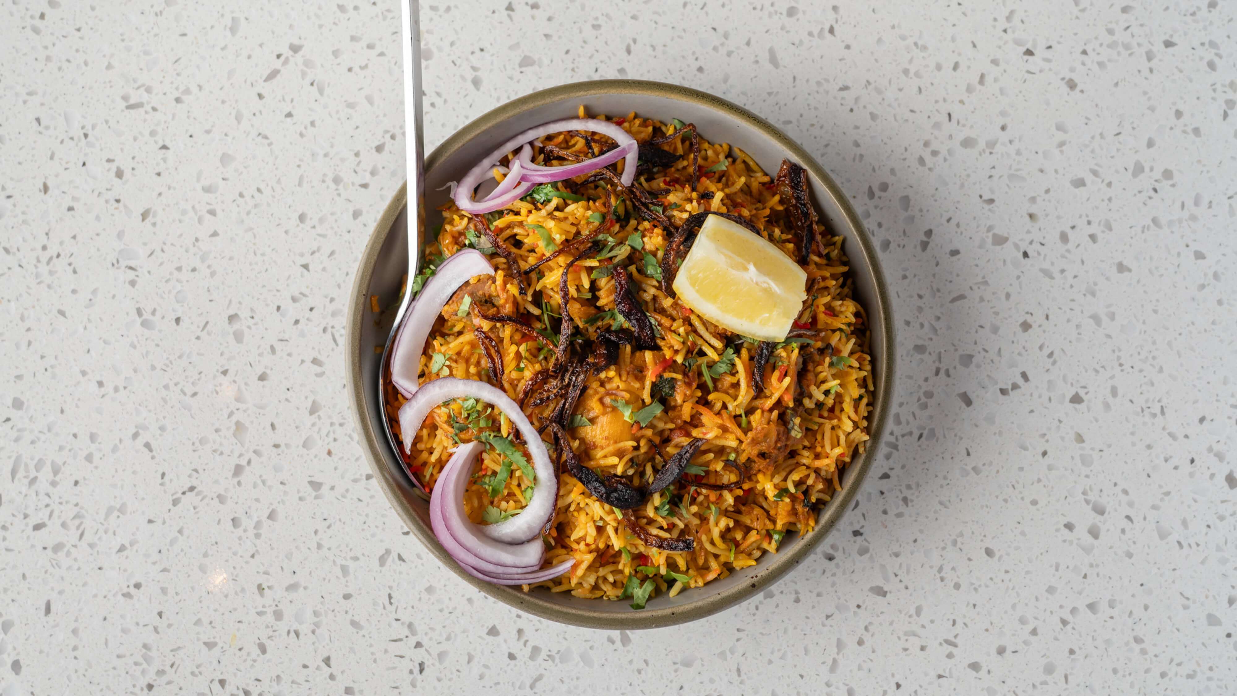 Lamb biryani - tender slow-cooked lamb with saffron basmati rice