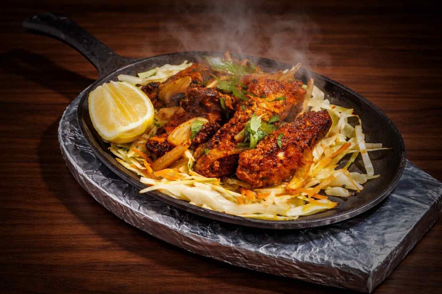 Paneer tikka - cottage cheese and vegetables grilled in clay oven