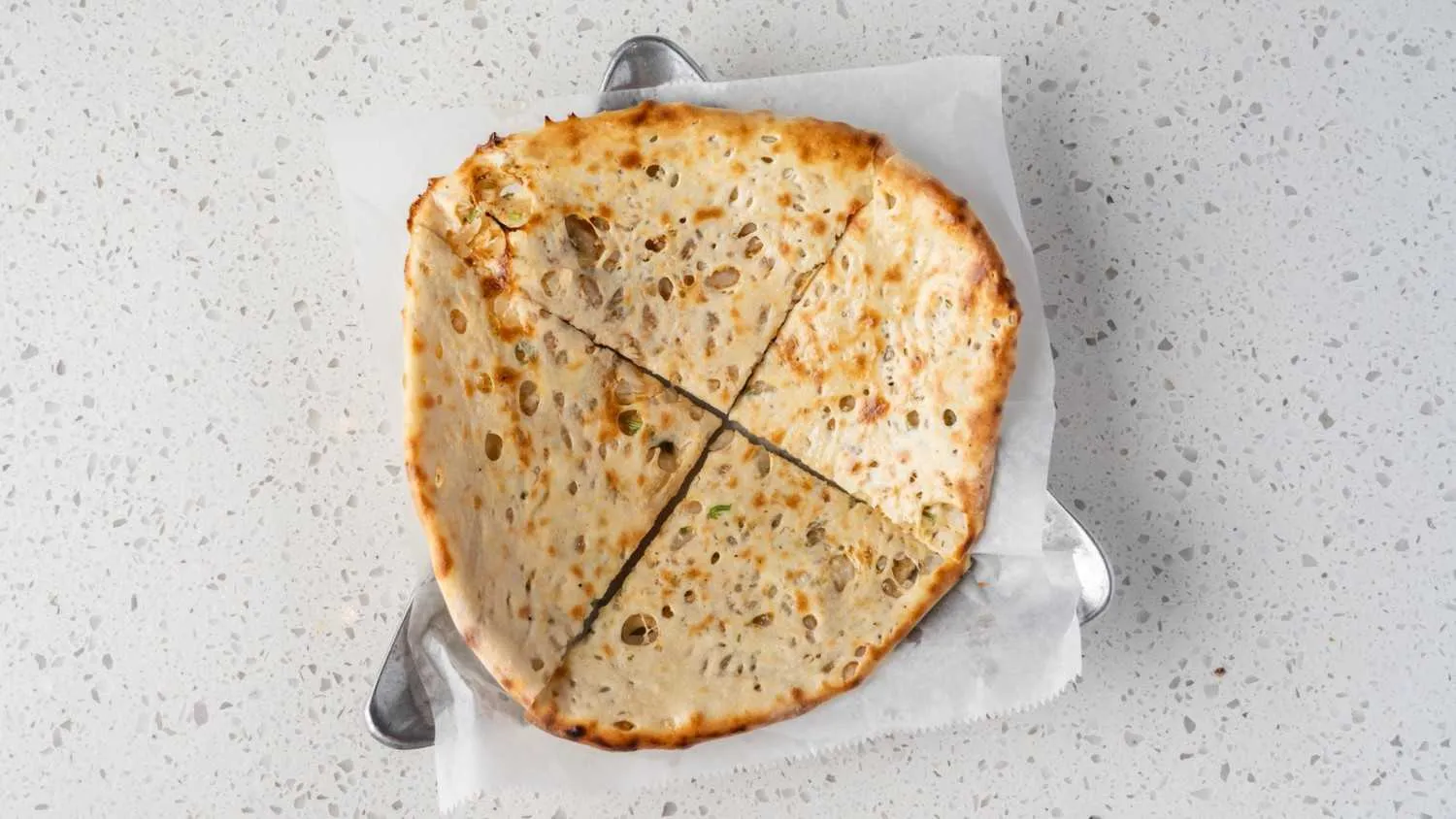 Onion kulcha - stuffed Indian flatbread with caramelized onions
